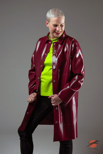 Wrapped in Rubber founder Charlie Goldthorpe wearing a glossy burgundy chore jacket
